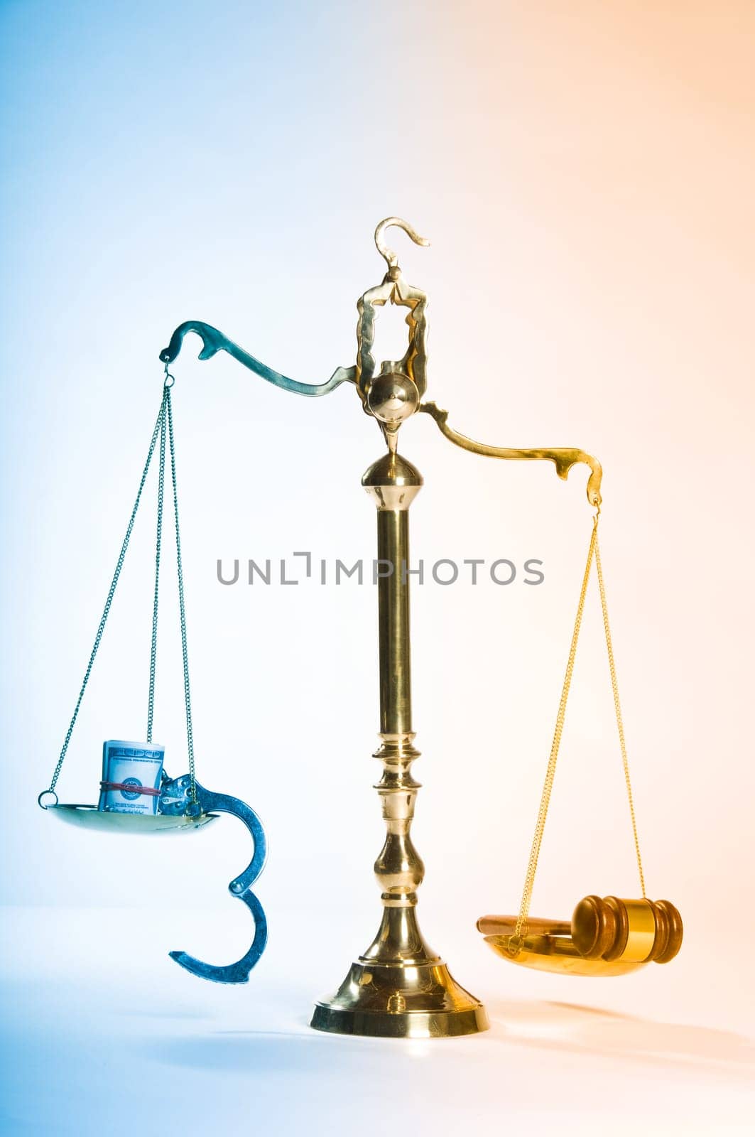 Wooden justice gavel and block with brass