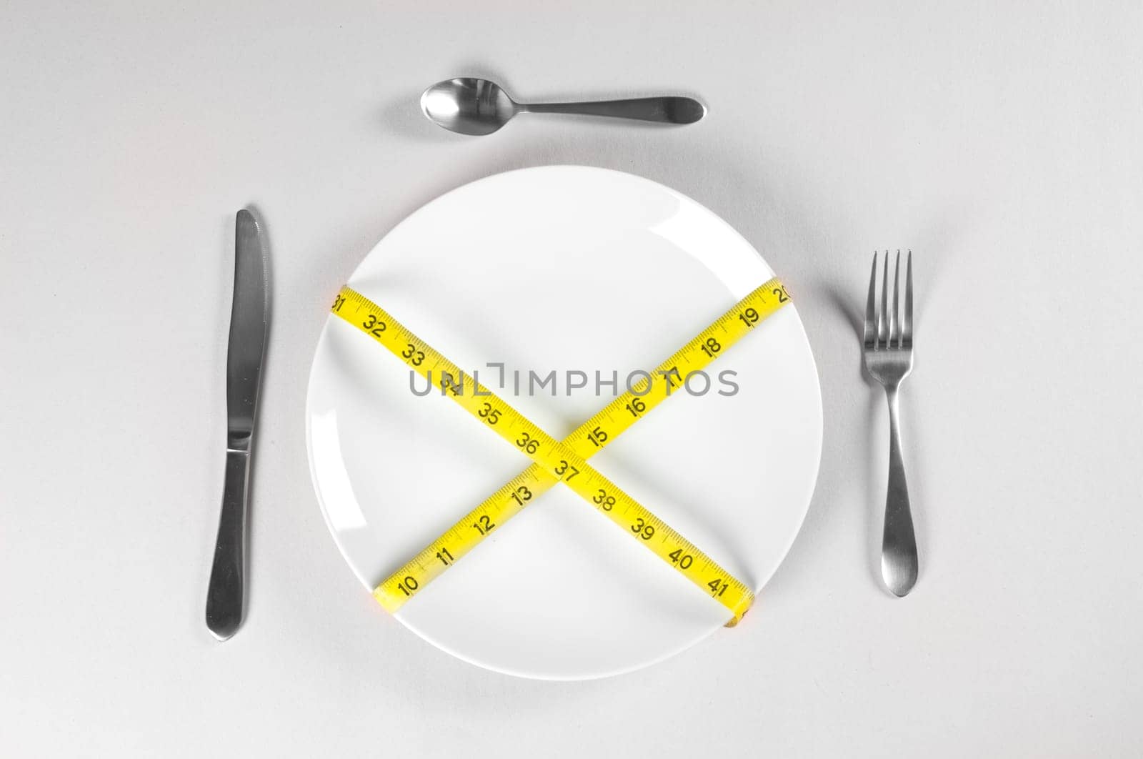 White Plate and Diet with nutrition and hunger