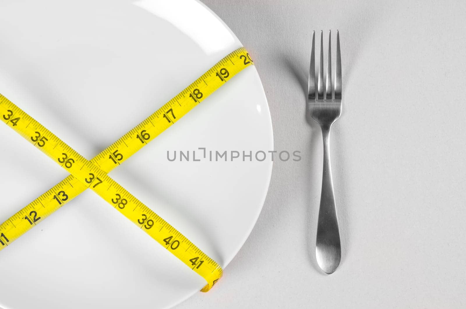 White Plate and Diet with nutrition and hunger