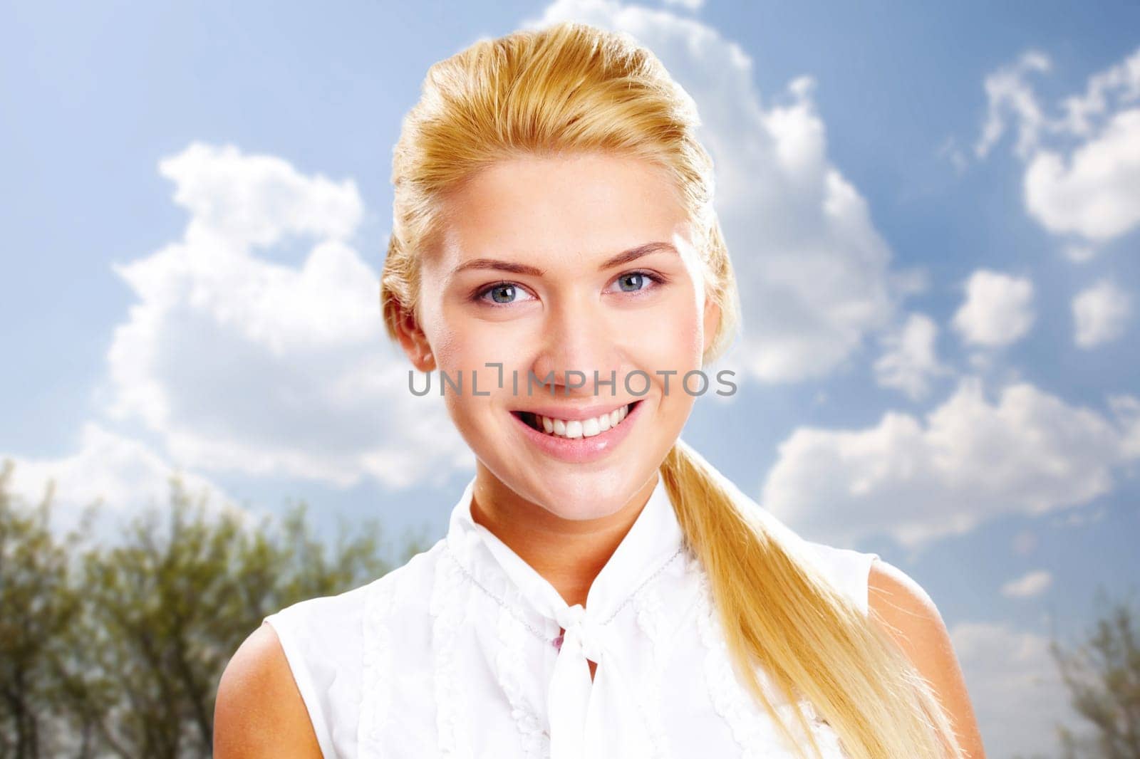 Portrait of beautiful lady with smile looking at camera