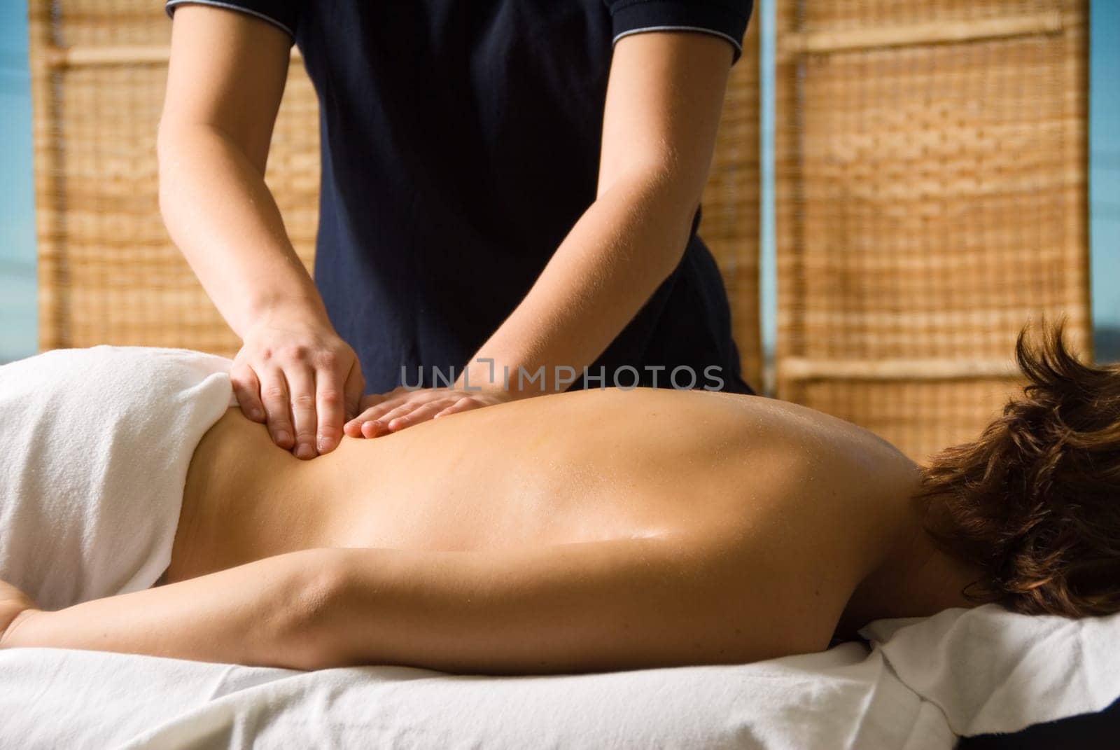 woman in a day spa getting a good massage