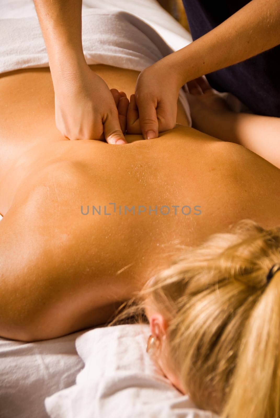 woman at a day spa getting a nice massage