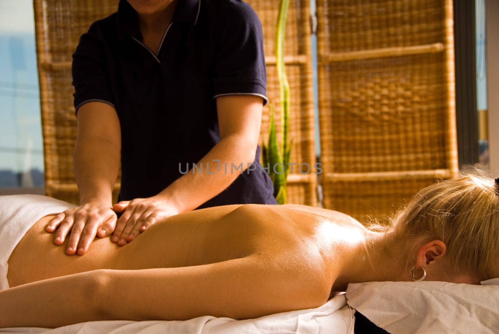woman at a day spa getting a nice back massage