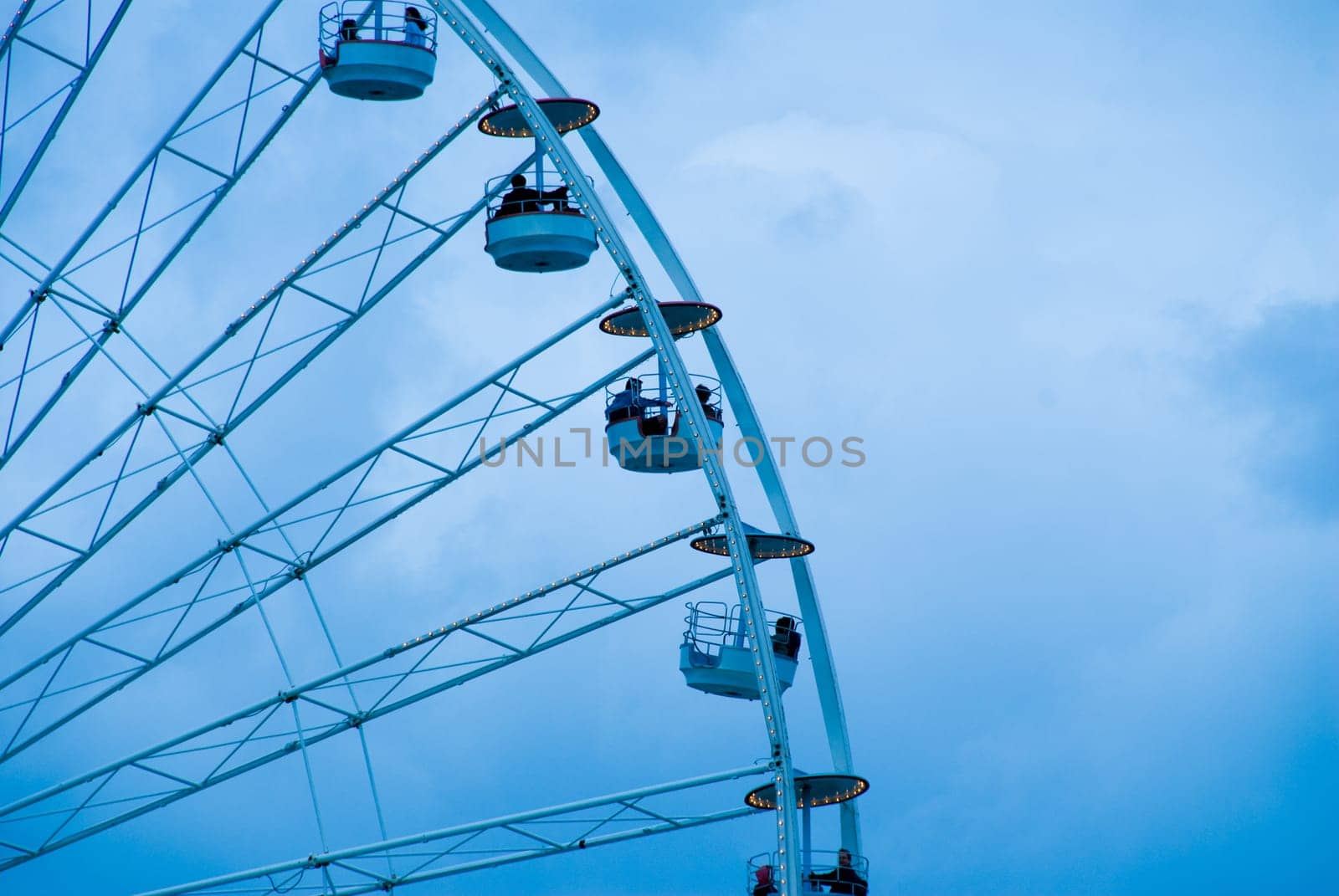 a ferris wheel in Paris in a blue tint