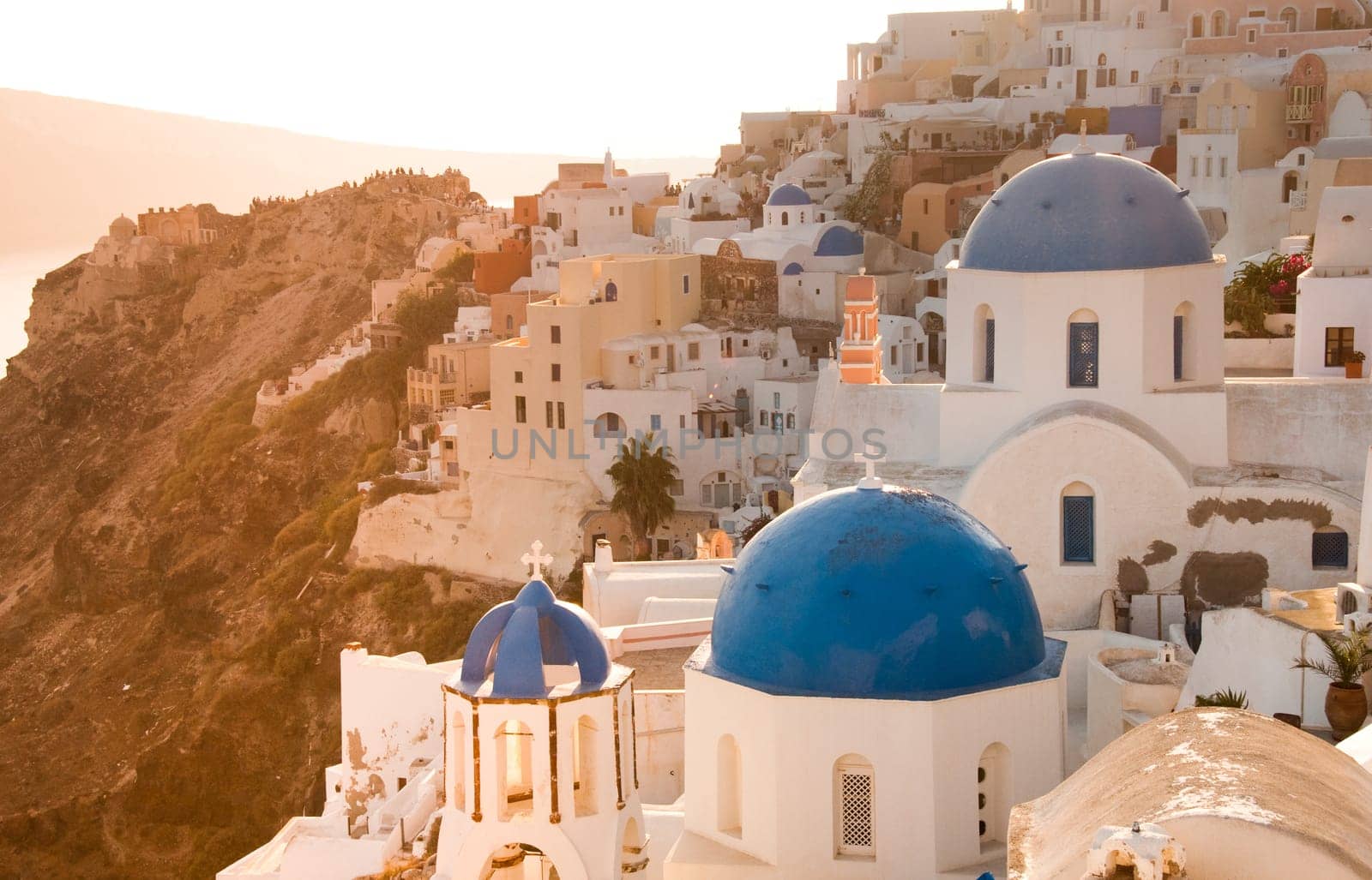 Greek church in santorini greece with a cross