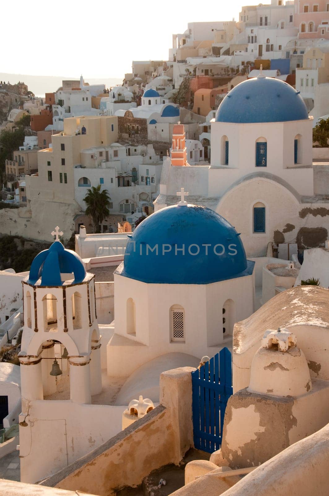 Greek church in santorini greece with a cross