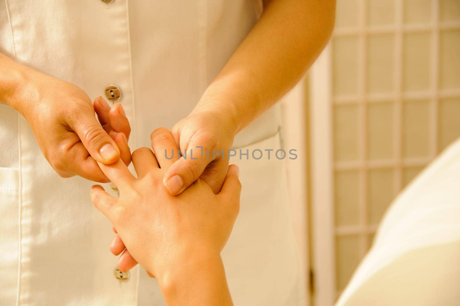 Beautiful woman in a spa with massage therapy