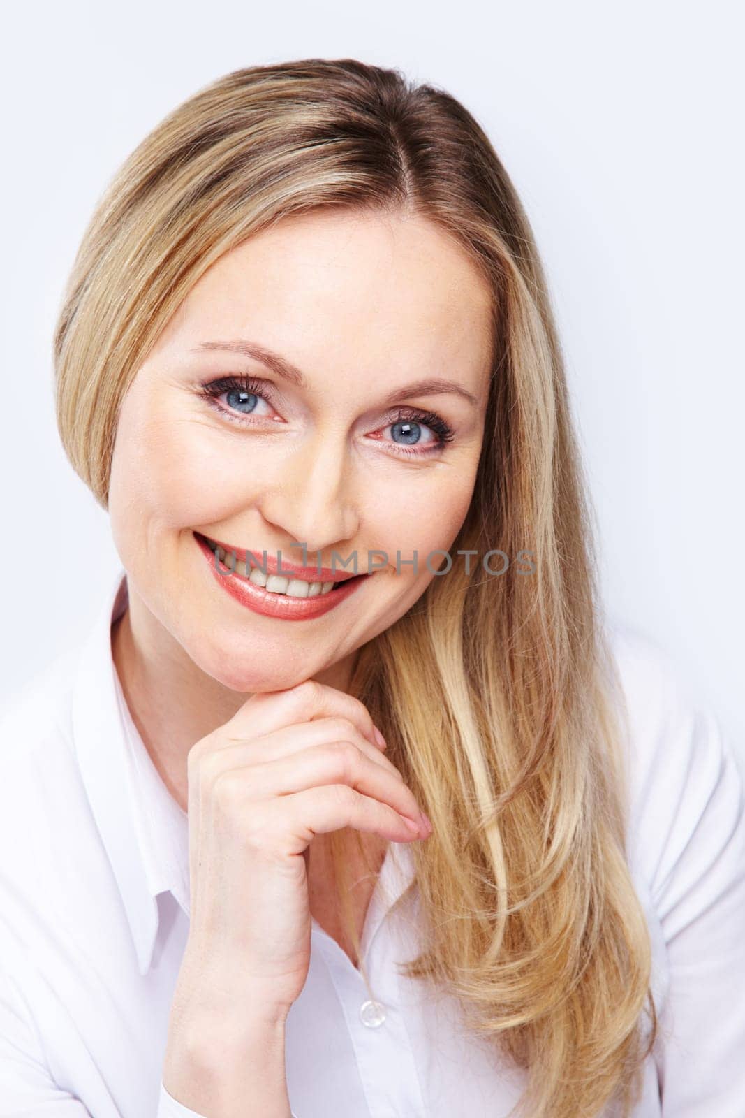 Portrait of beautiful woman with smile looking at camera