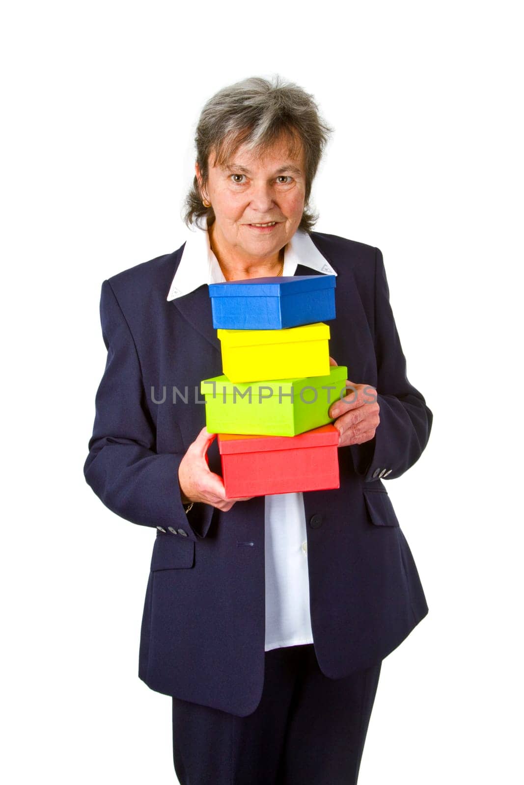 Senior woman with colorful gifts - isolated on white background