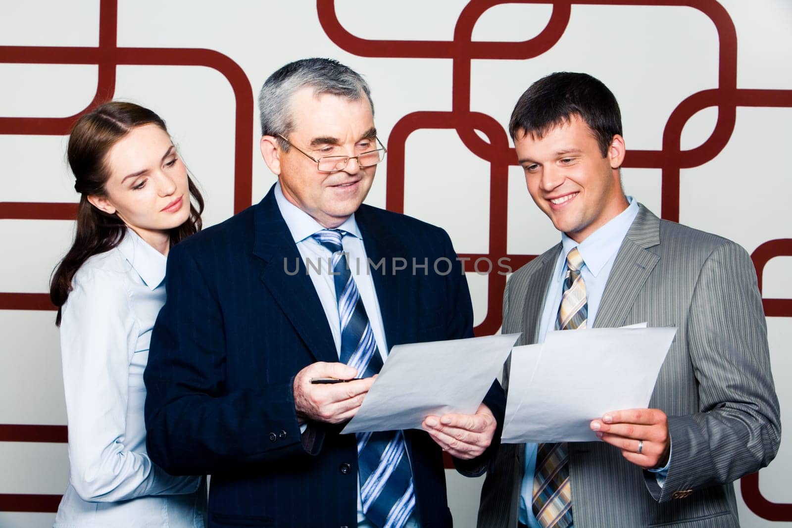 Portrait of business people discussing a new project at meeting