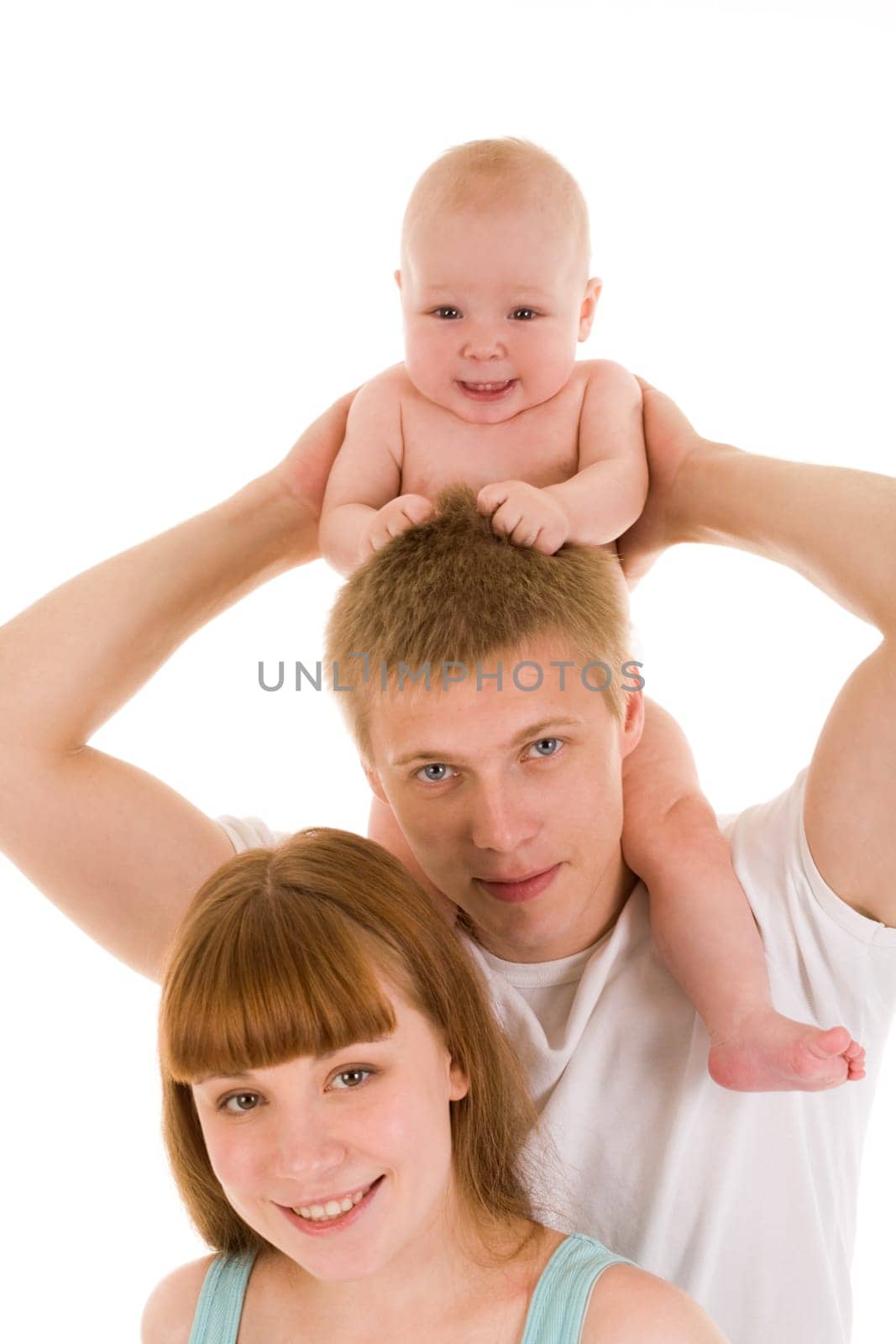 Portrait of joyful family looking at camera over white background