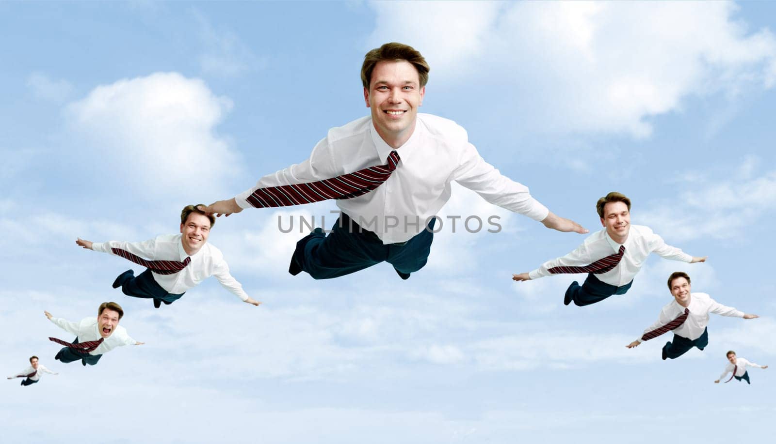 Conceptual image of many businessmen flying in the clouds