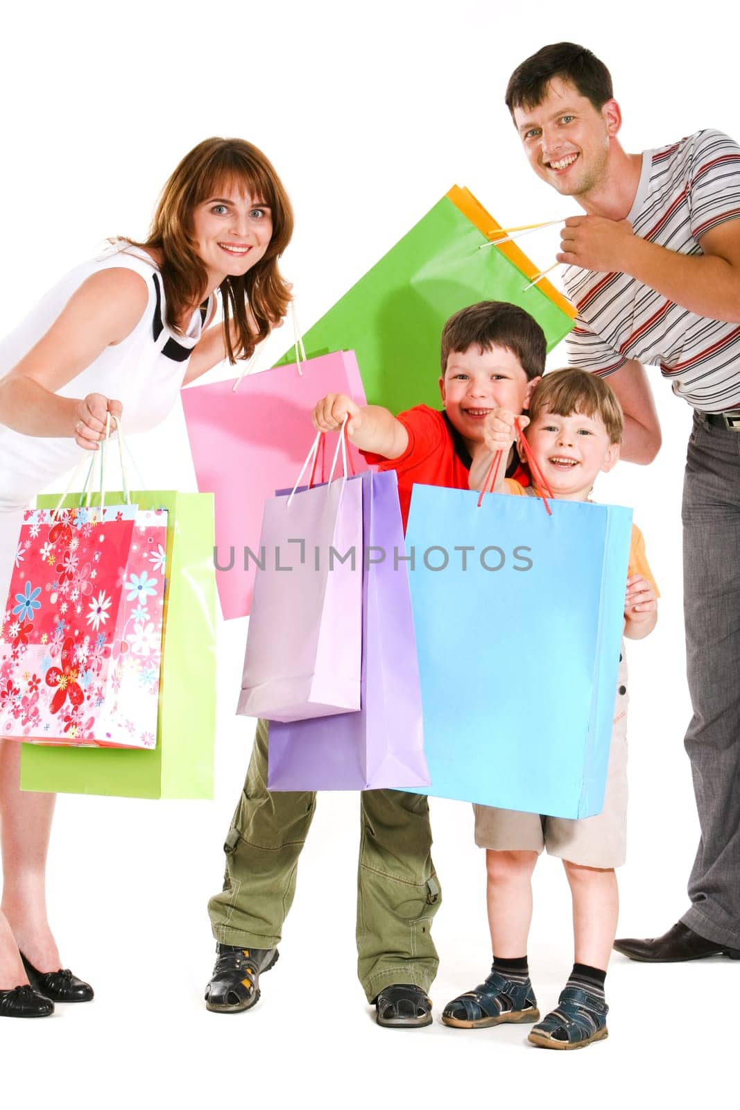 Image of cheerful family members standing next to each other with happy expression