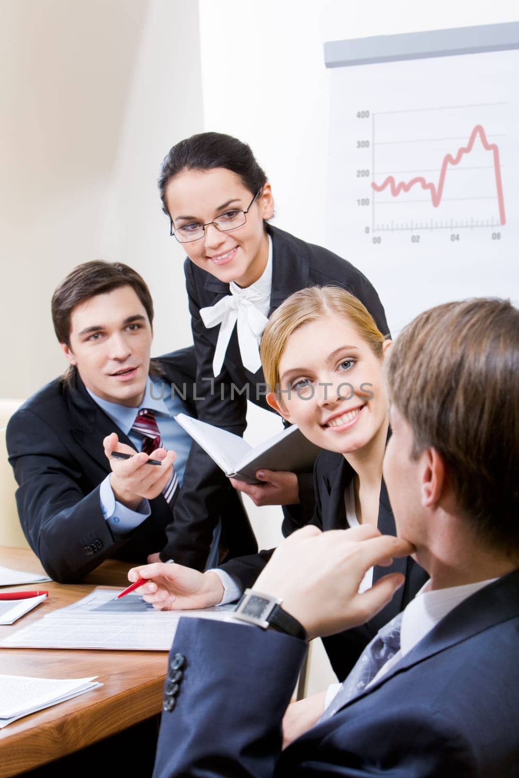 Photo of business group having hot discussion during seminar