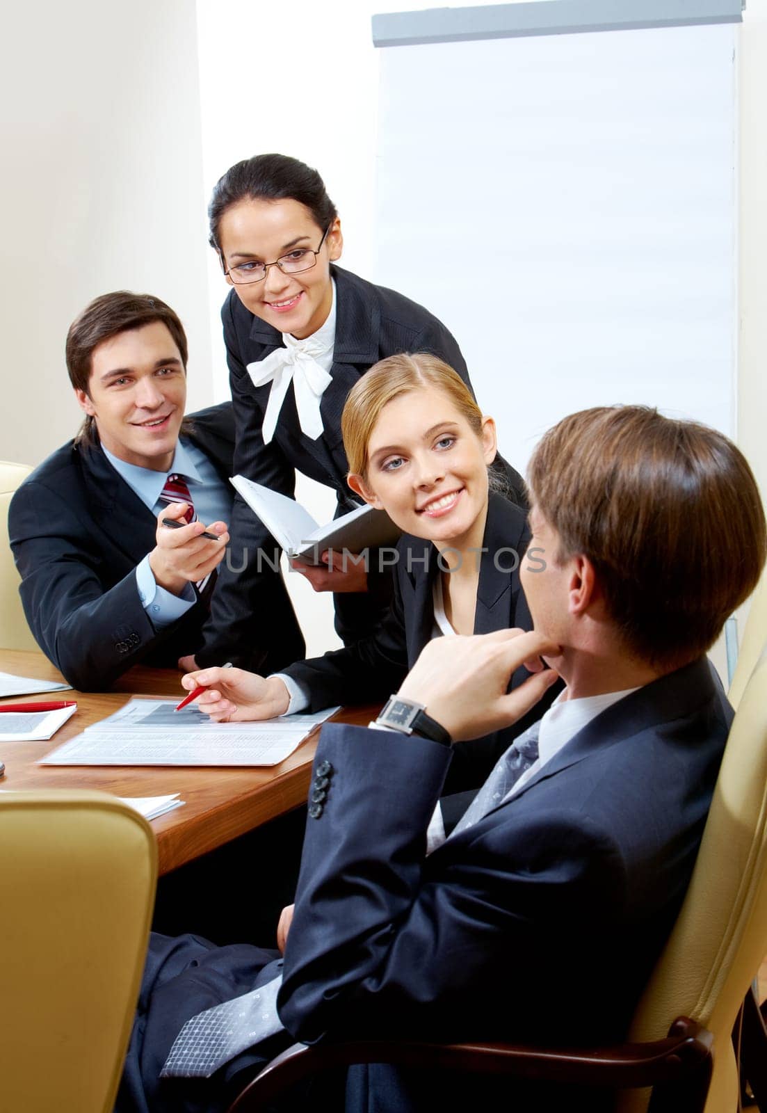 Photo of business group having hot discussion during seminar