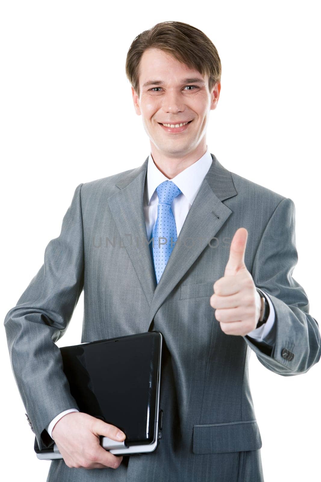 Portrait of happy businessman holding the laptop and showing thumb up