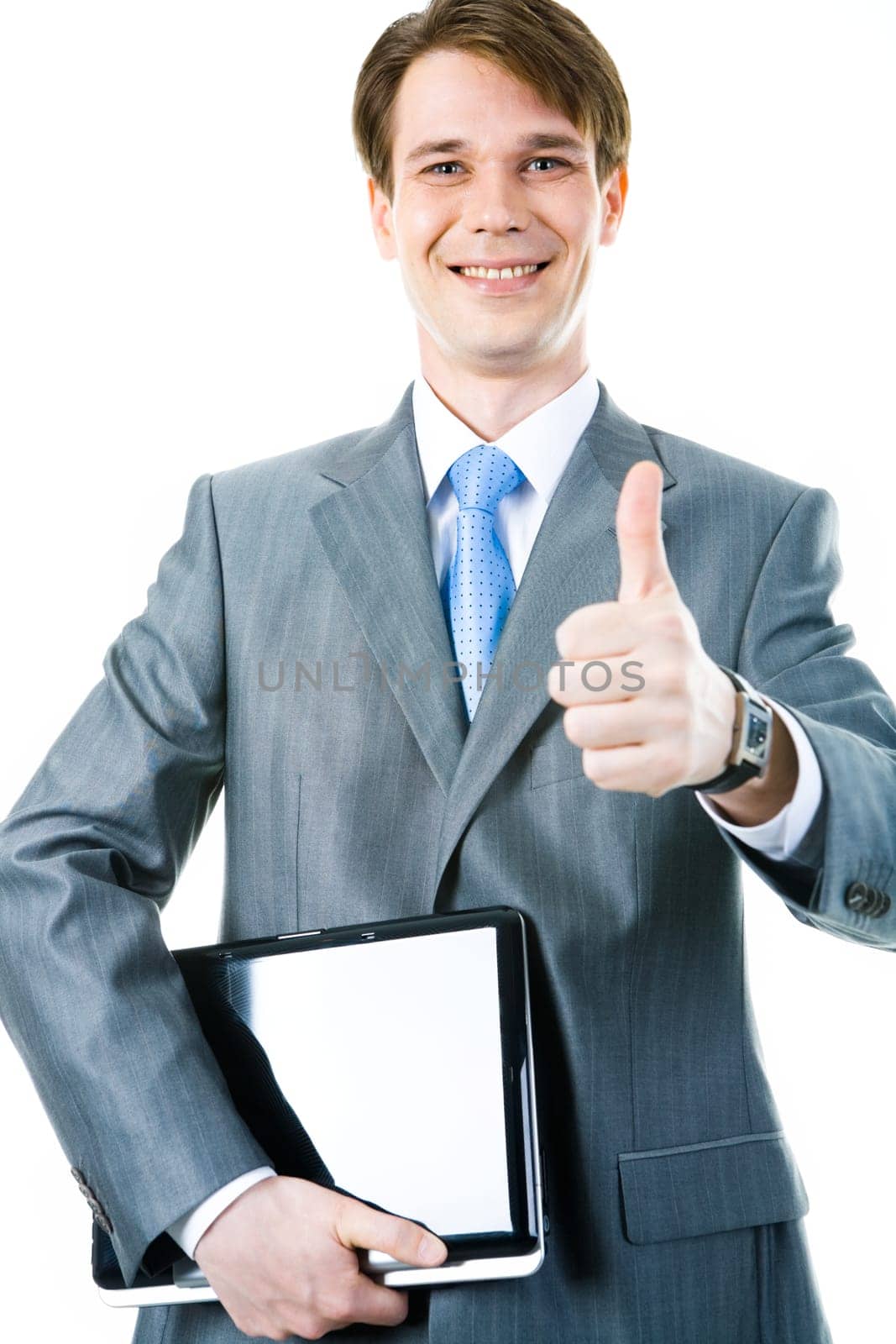 Portrait of happy businessman holding the laptop and showing sign of okay