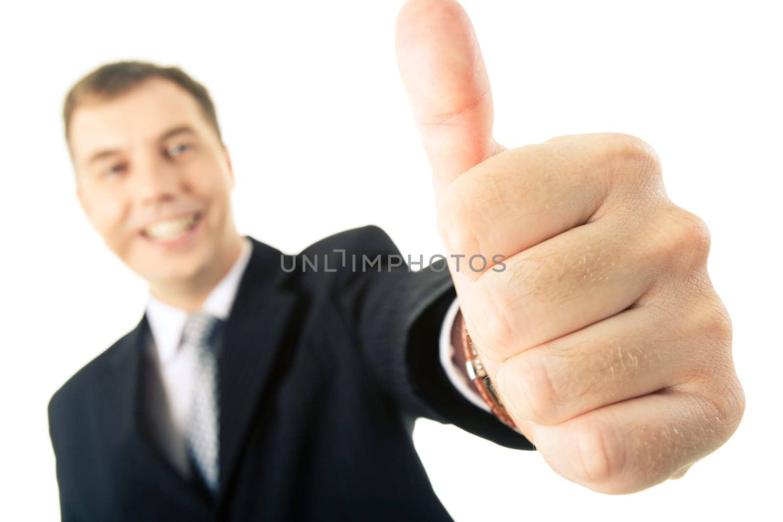 Businessman showing thumb up as a sign of successful deal