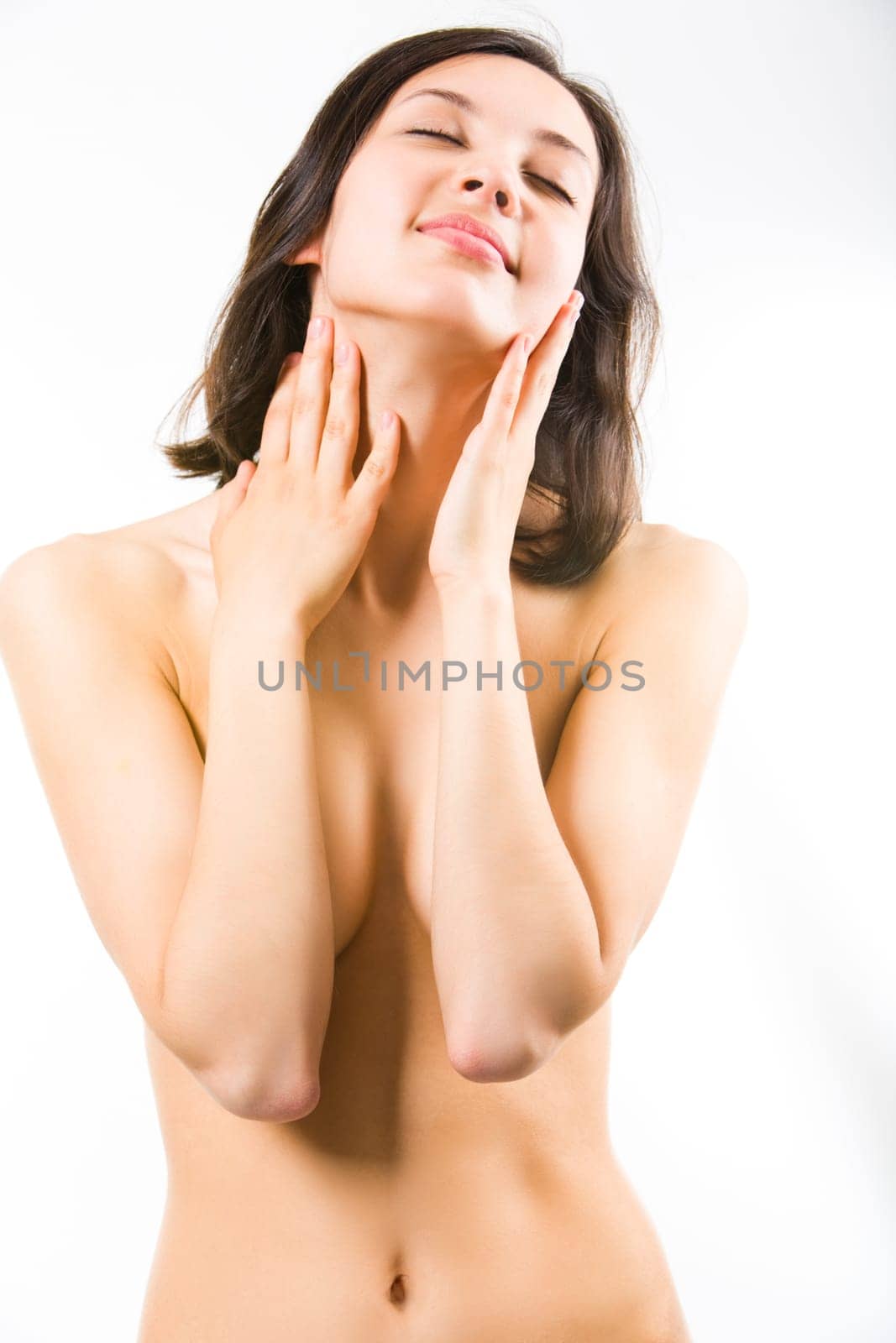 Photo of sexual woman with brown hair on a white background