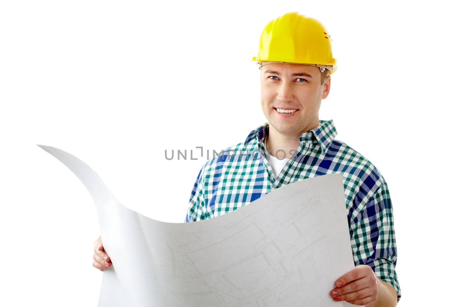 Portrait of a smiling worker in helmet holding a plan
