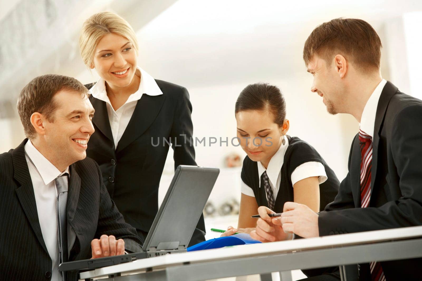 Portrait of interacting businessteam thinking about new project at meeting