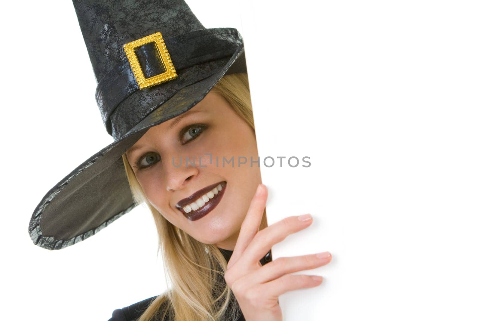 Halloween witch looking out of board with your advert