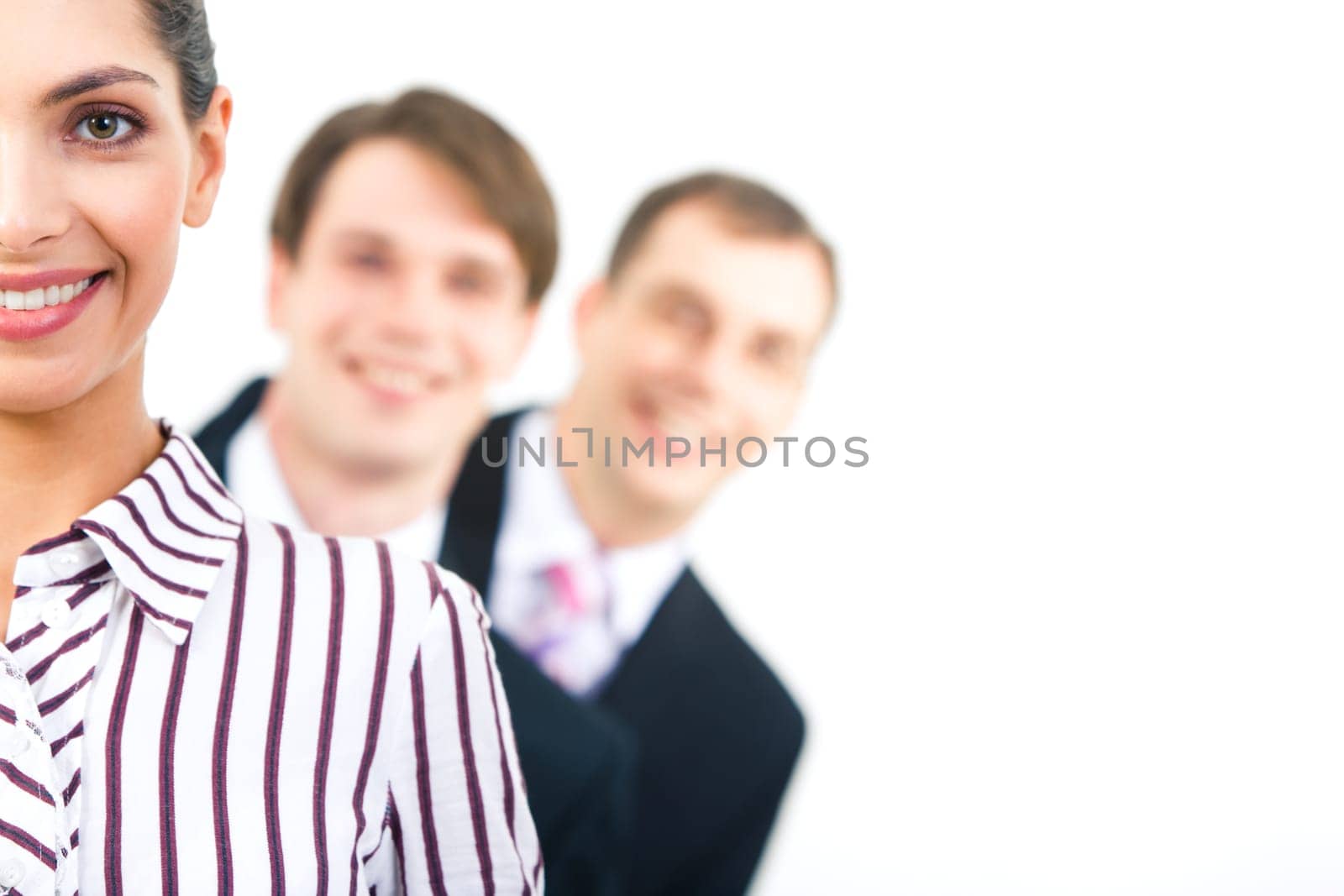 Half face of business leader on the background of two men looking at camera