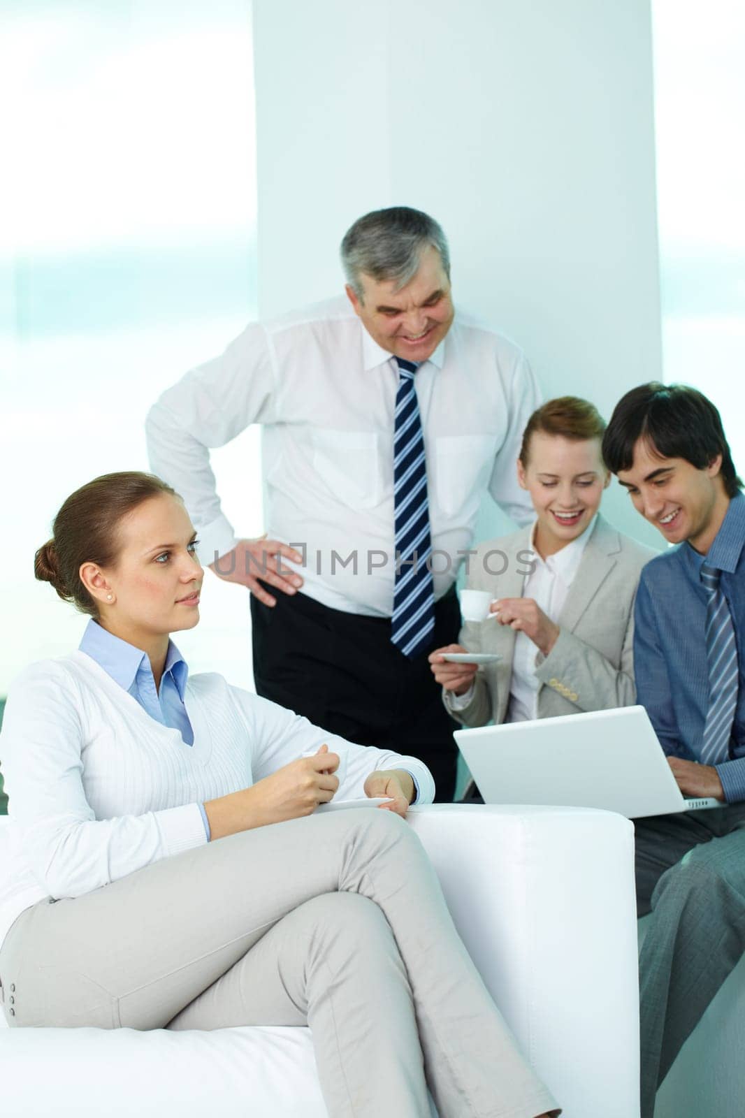 Portrait of pretty secretary having coffee in working environment
