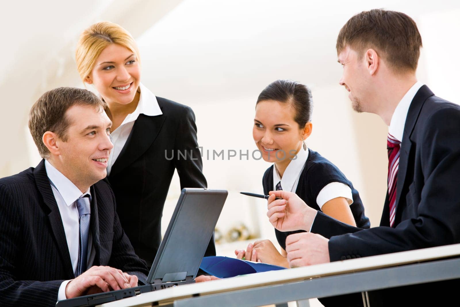 Portrait of interacting businessteam thinking about new project at meeting