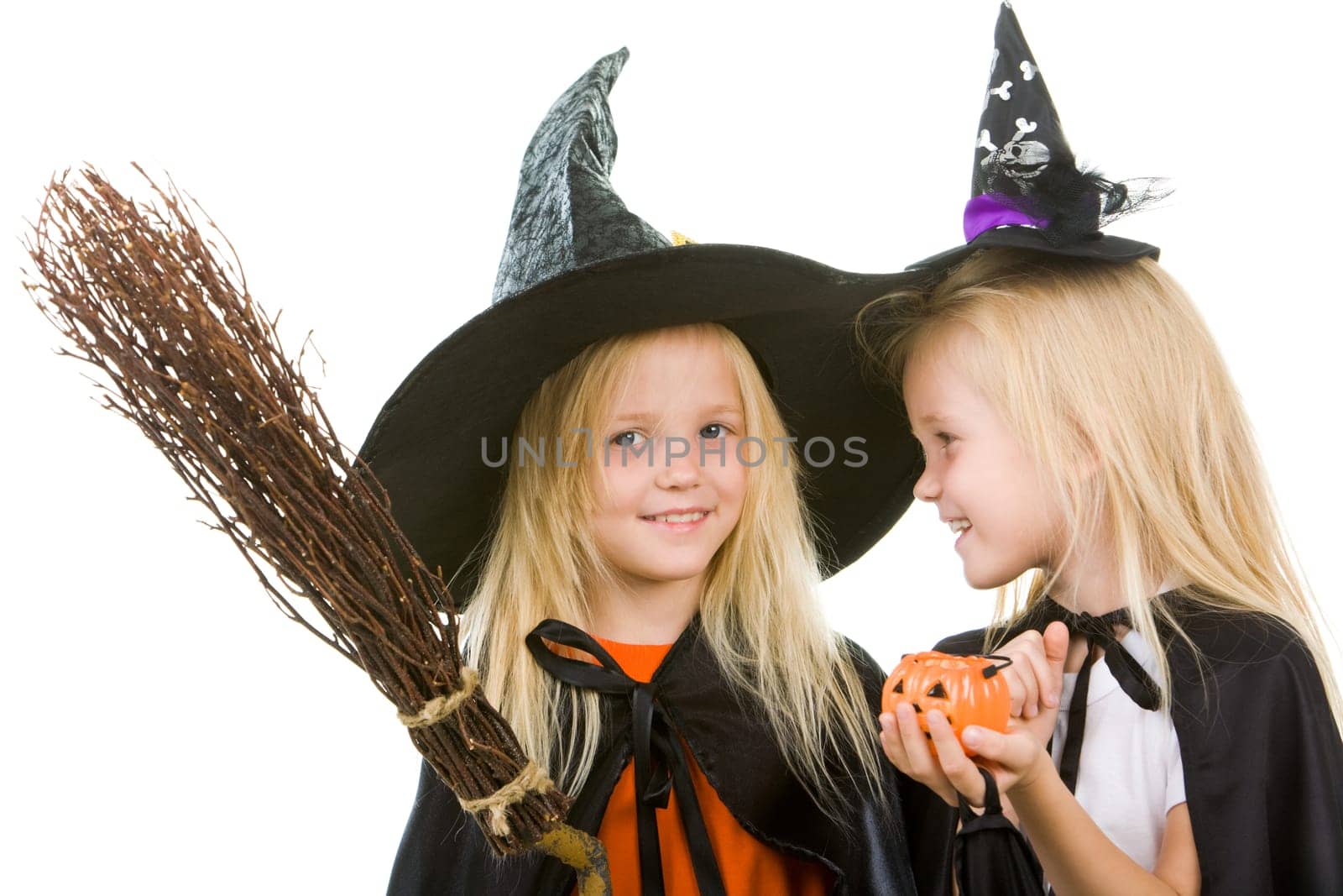 Portrait of twins in black hats and black clothing