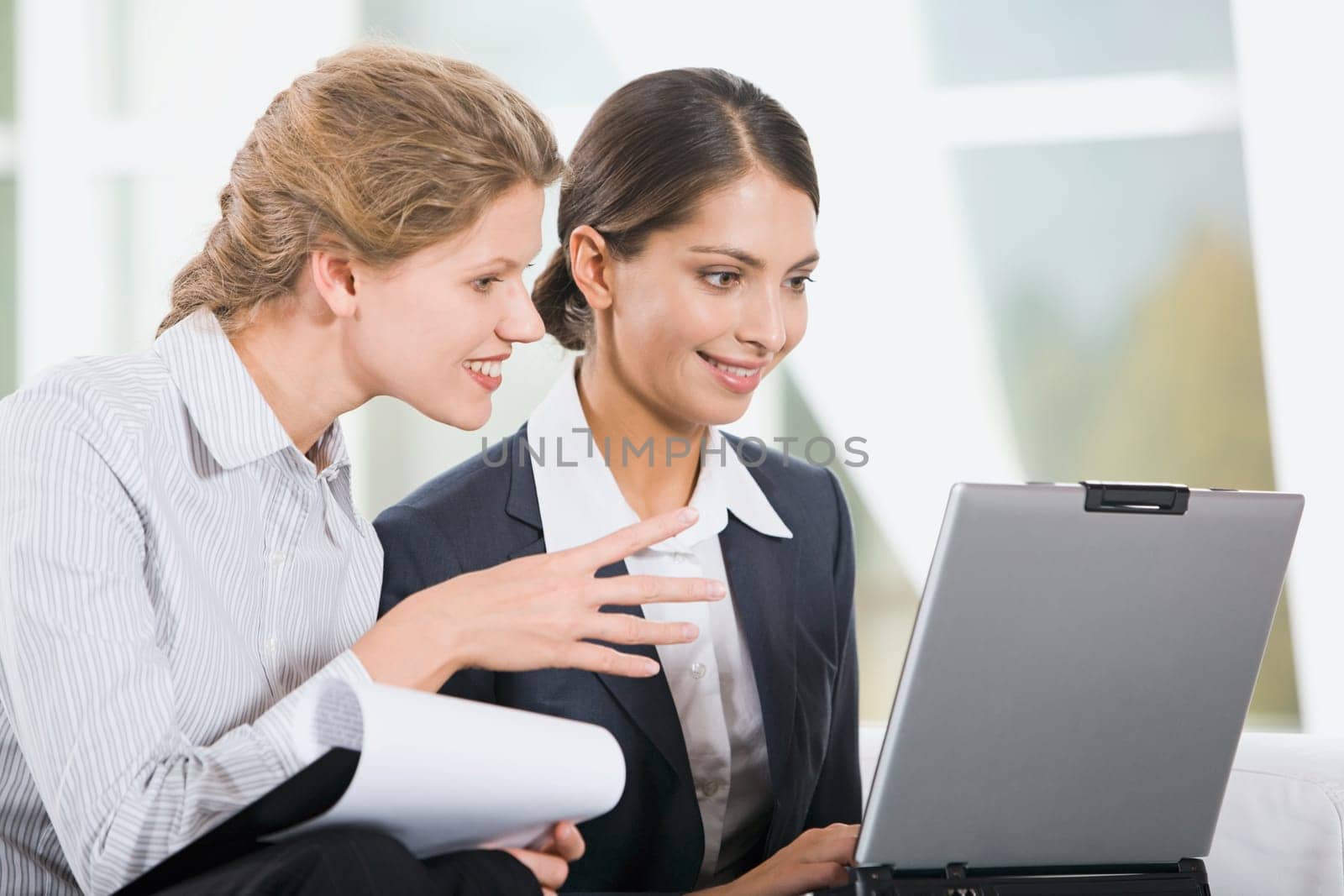 Business woman explains a functional obligations to her new colleague