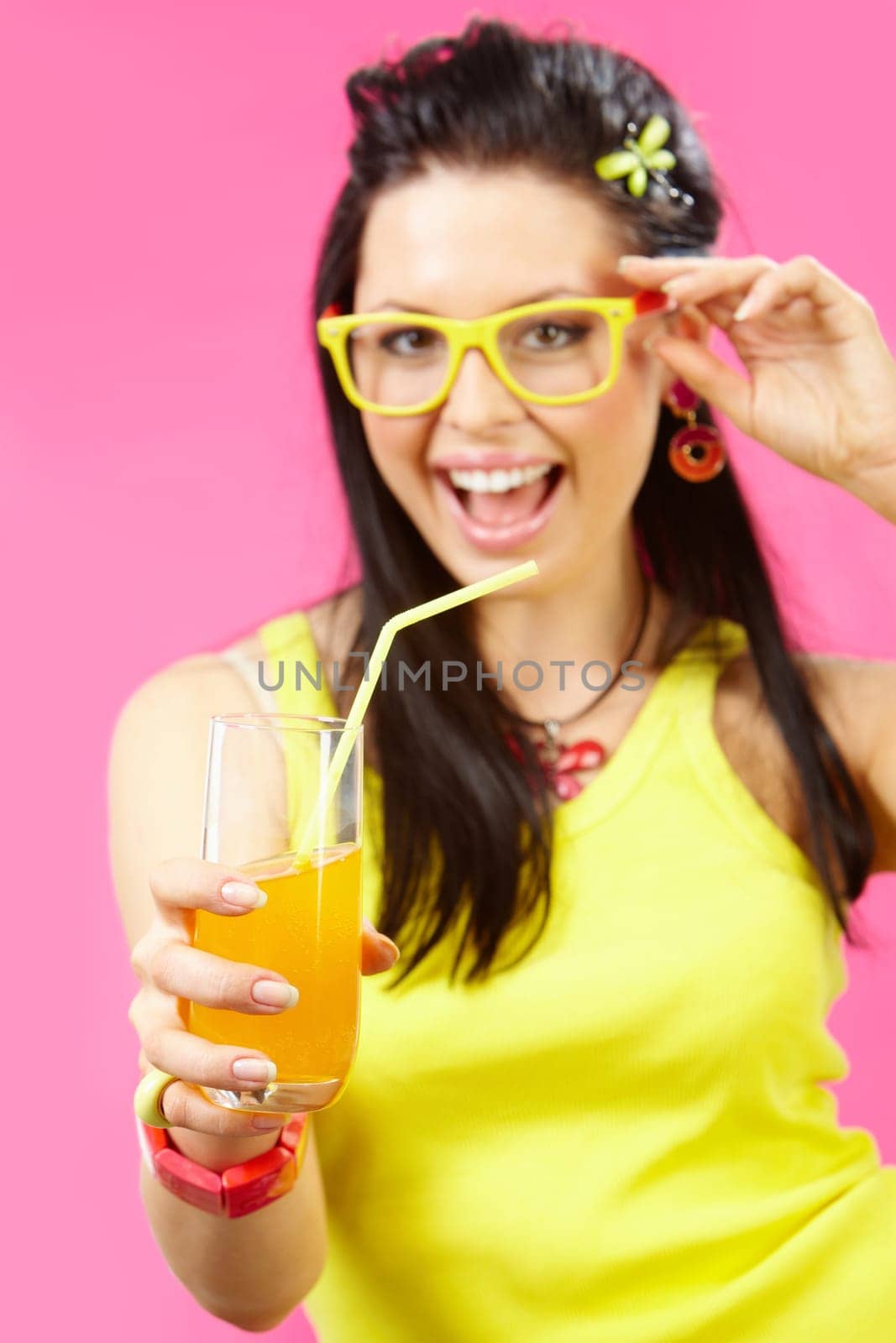 Image of delicious orange juice in female hand