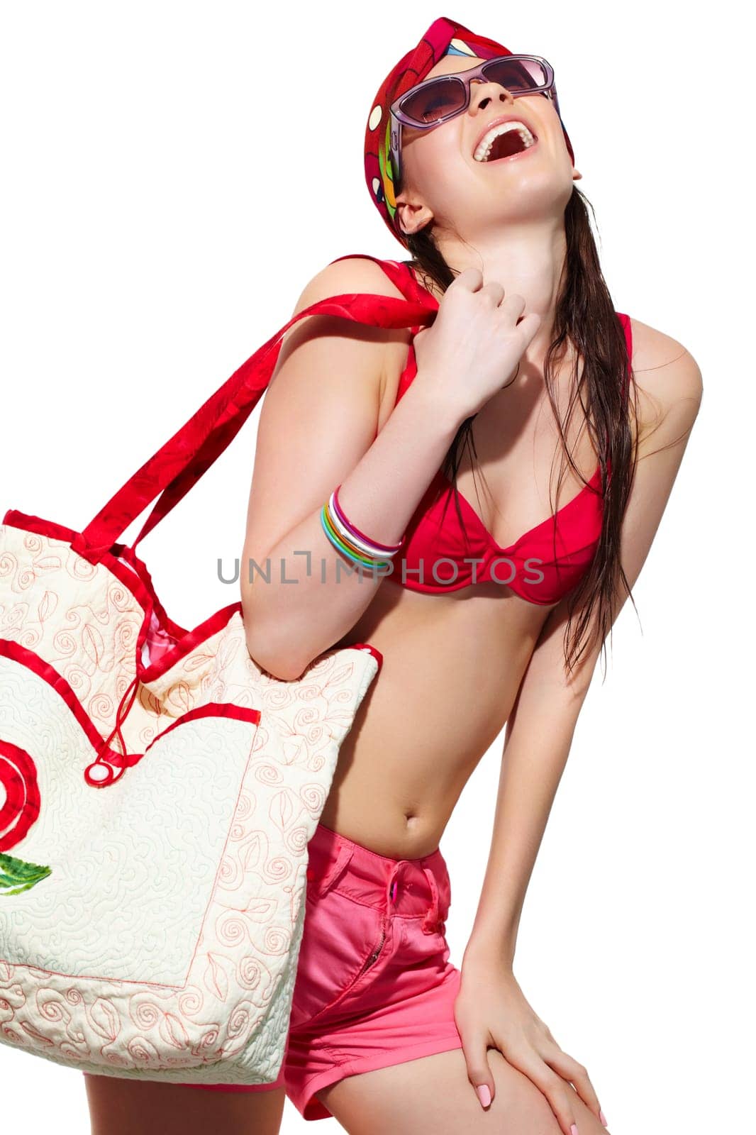 Portrait of a young laughing girl in bikini