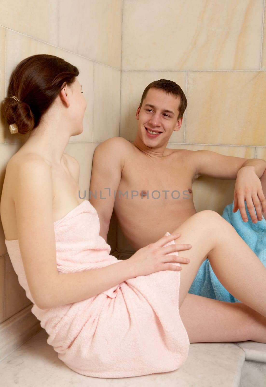 Image of happy couple resting after taking bath