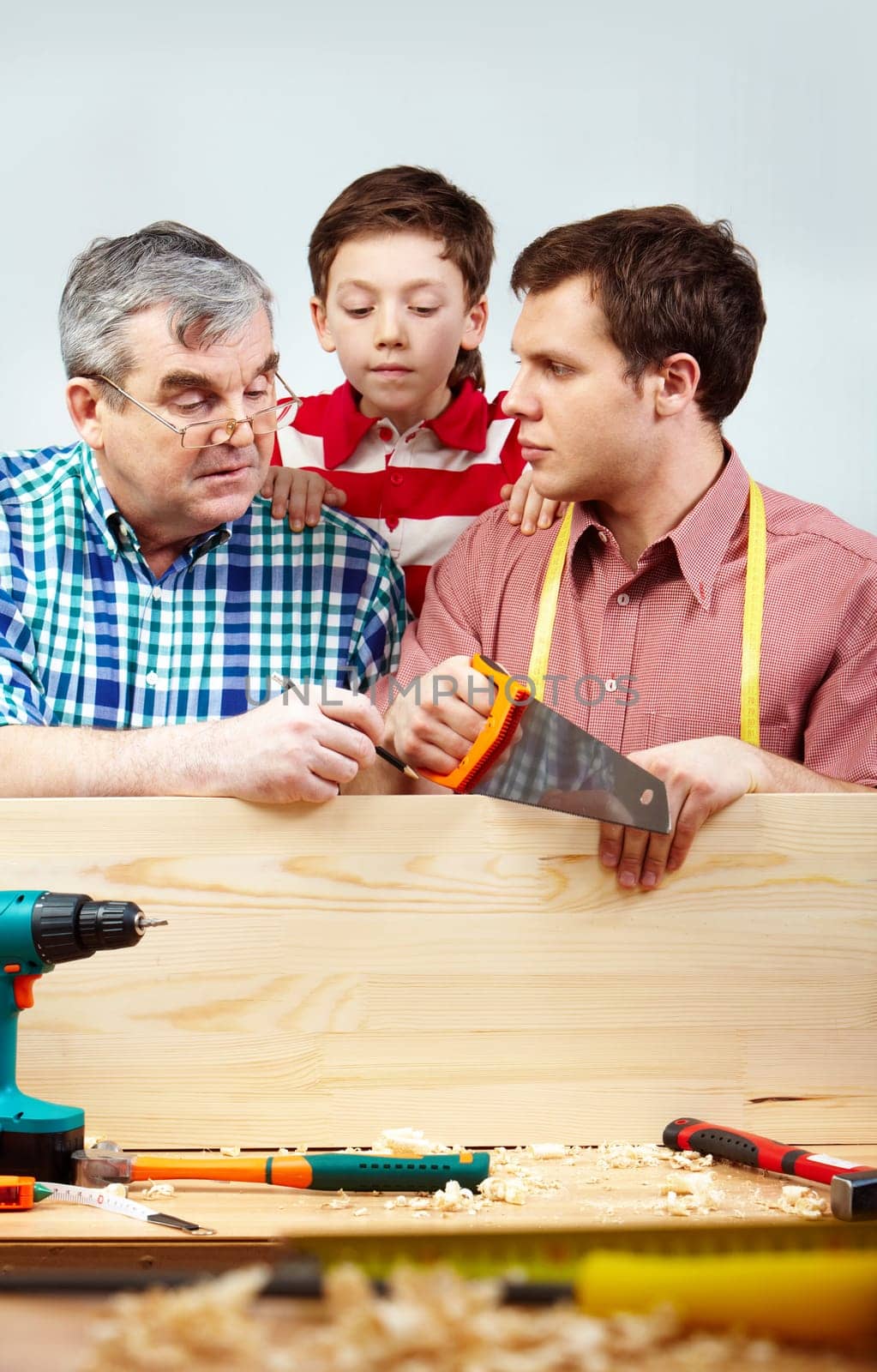 Family of men working with diy tools