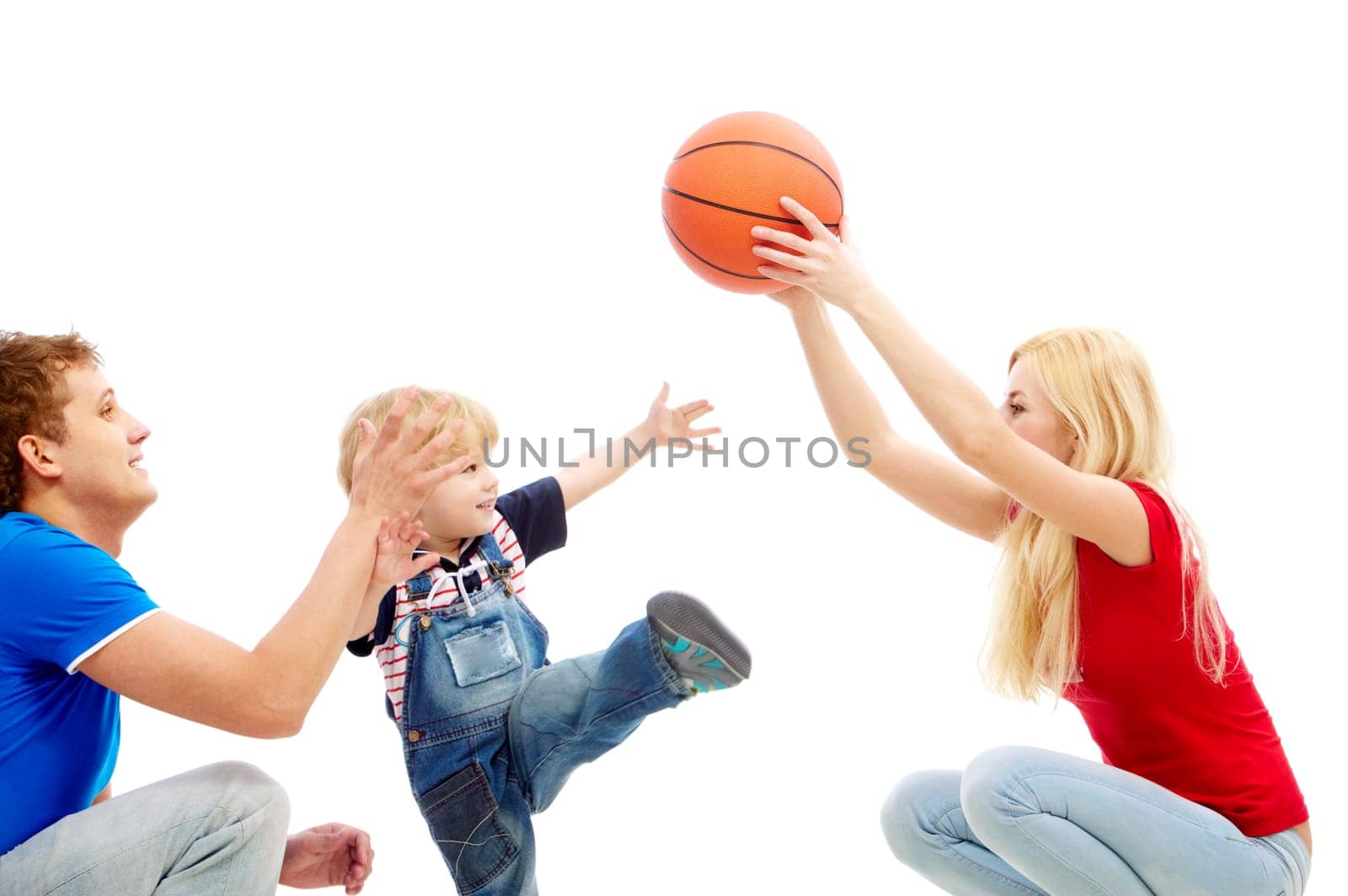 Image of mom and dad playing with their son
