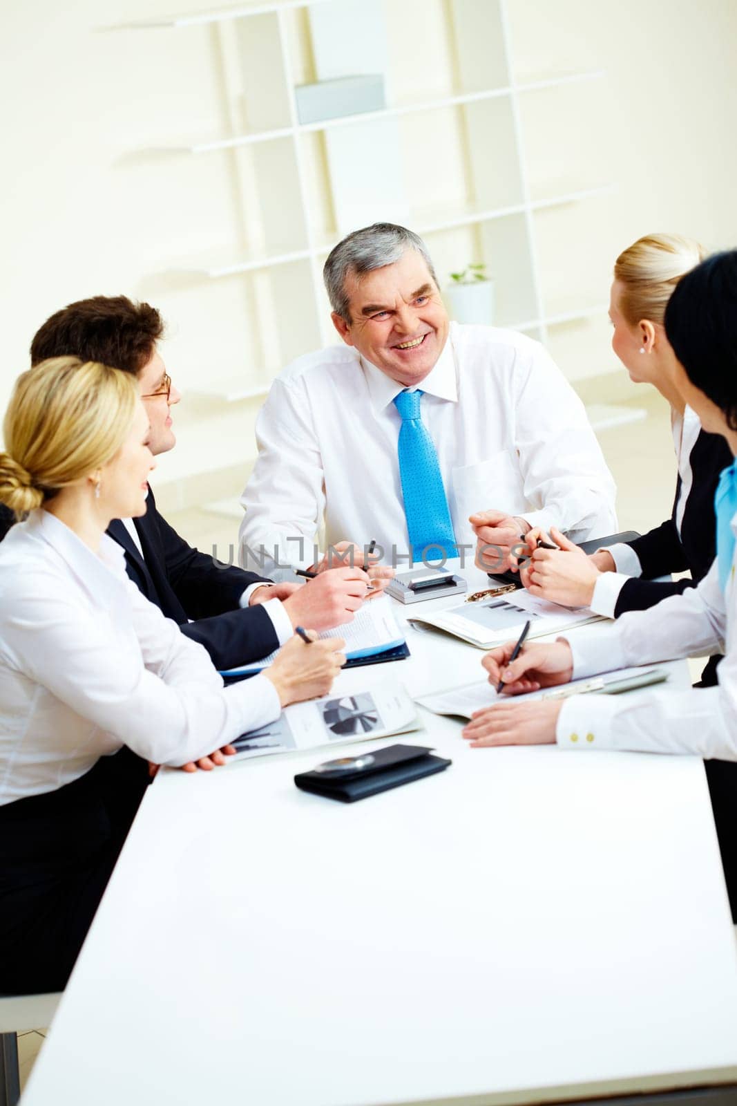 Image of senior leader making speech at meeting
