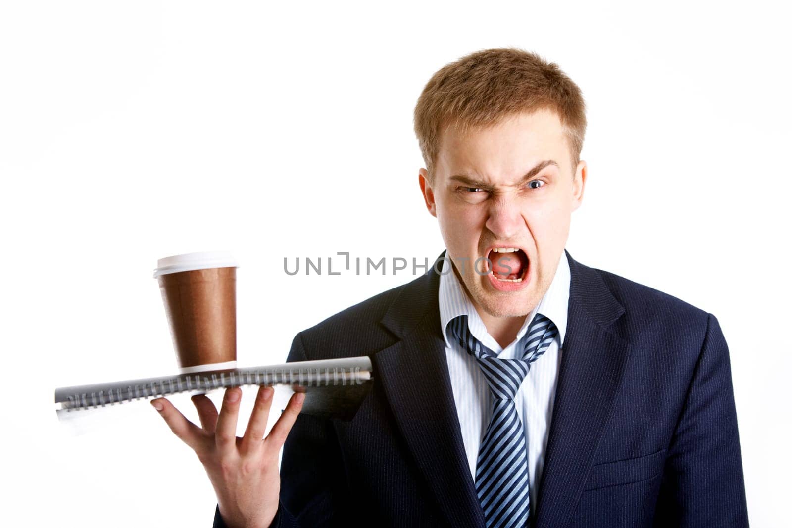 Portrait of young dissatisfied businessman shouting in isolation