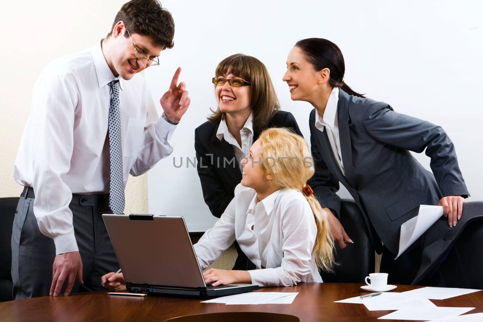 Three women listen to the man which gives them the instruction