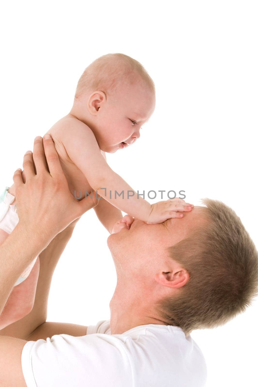 Portrait of loving father and his baby cuddling