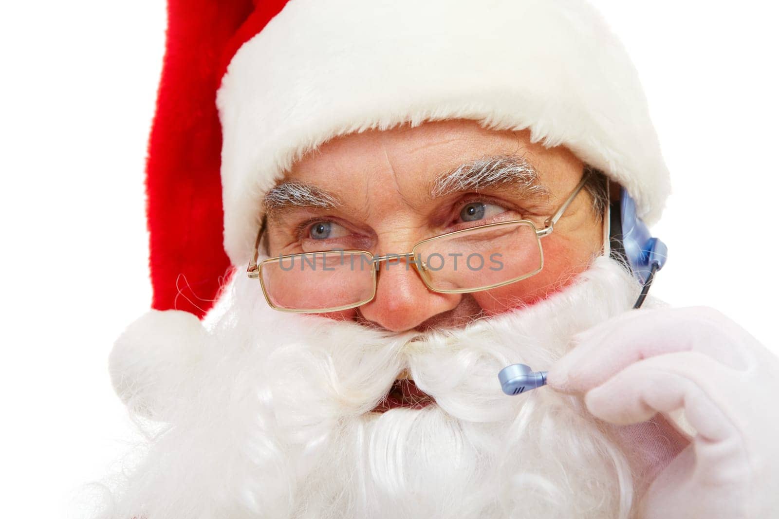 Photo of Santa Claus with headset talking to somebody