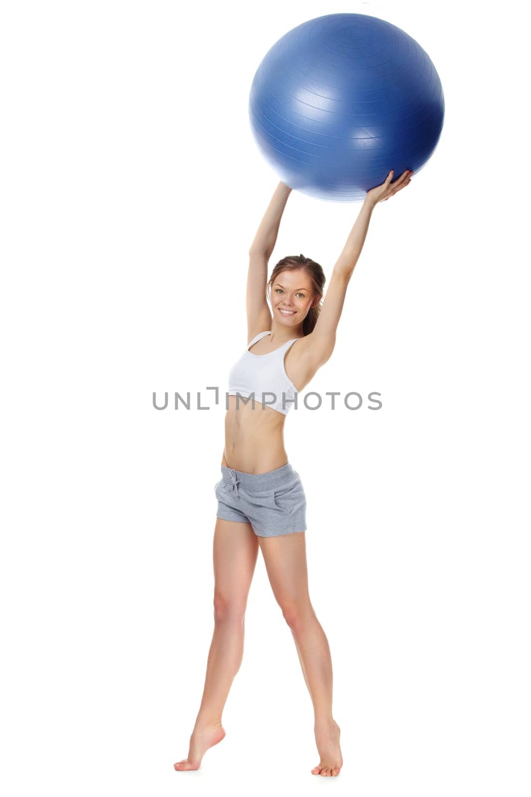 Portrait of a young girl holding gymnastic ball