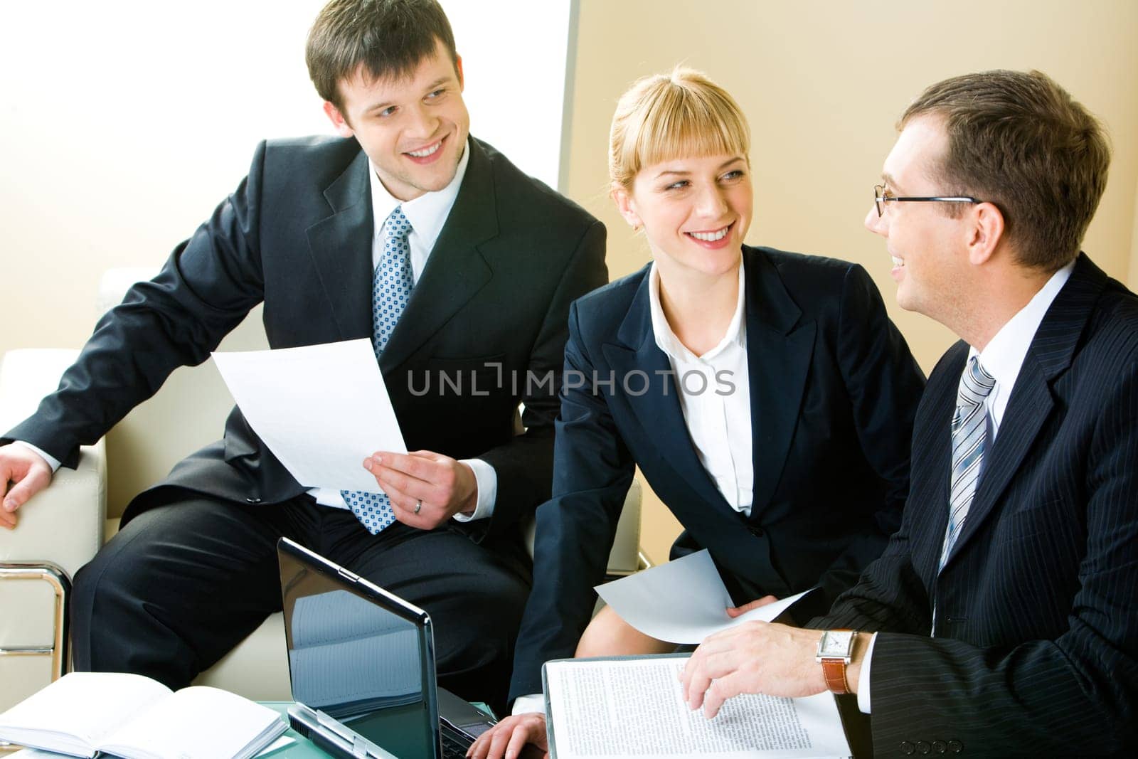 Business man and woman looking at boss of company during   negotiations