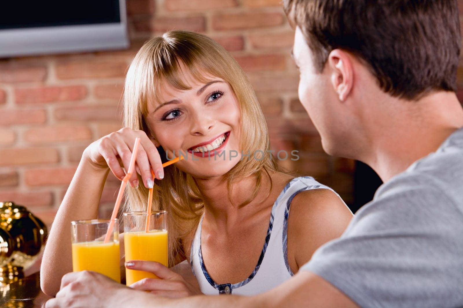 Photo of  a beautiful amorous woman listening to the man