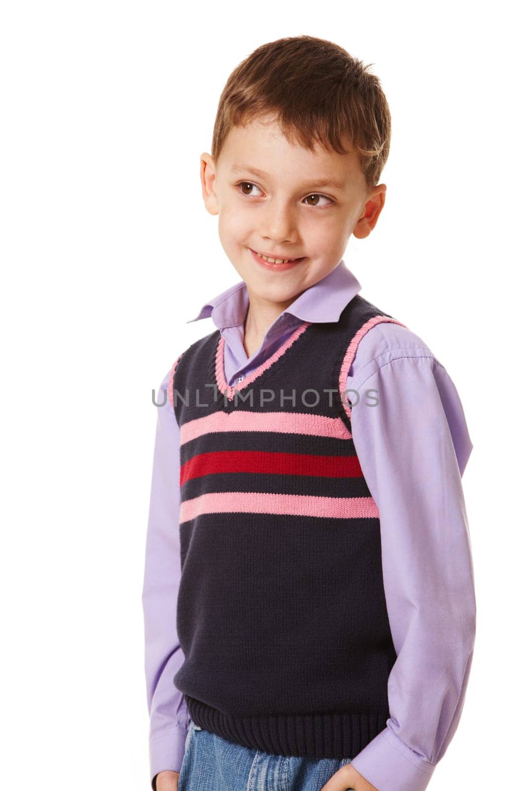 Portrait of smiling boy looking aside on a white background