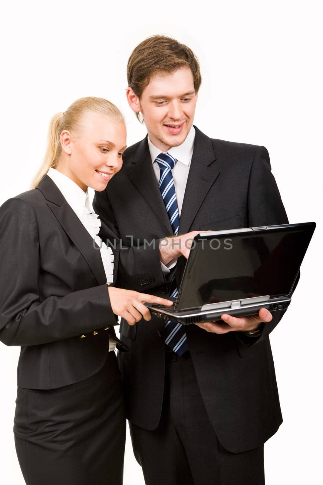 Portrait of co-workers planning new project and looking at laptop screen