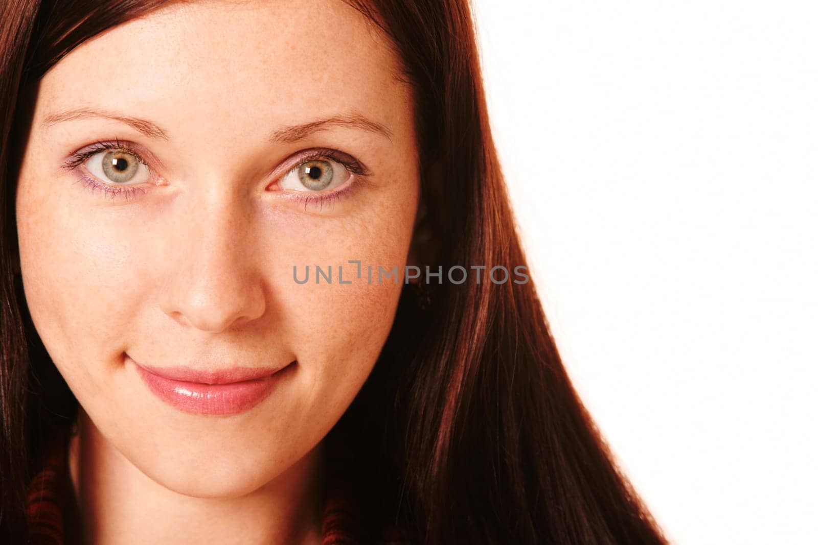 Face of pretty woman looking at camera with smile