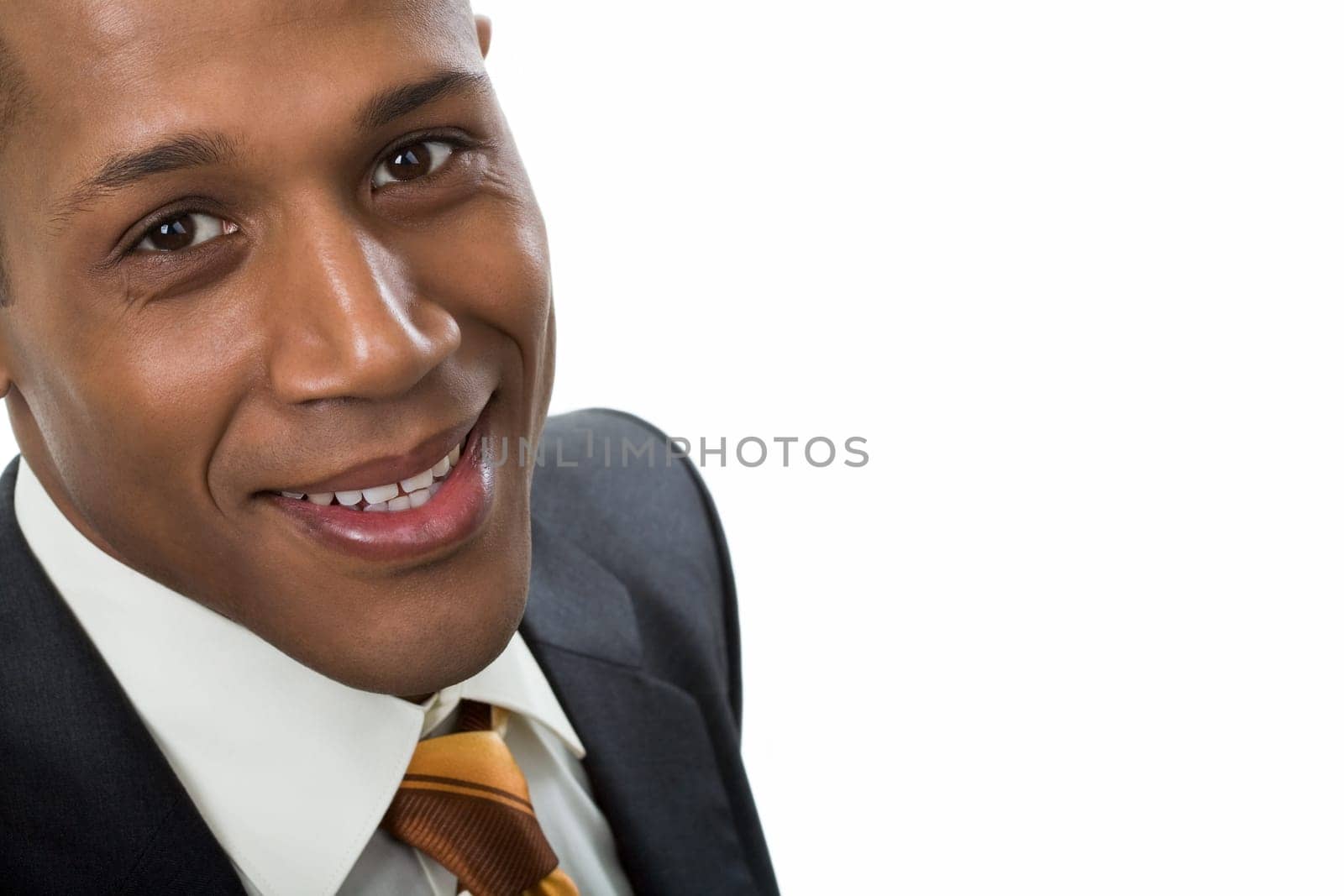 Face of happy Afro American businessman looking at camera with smile