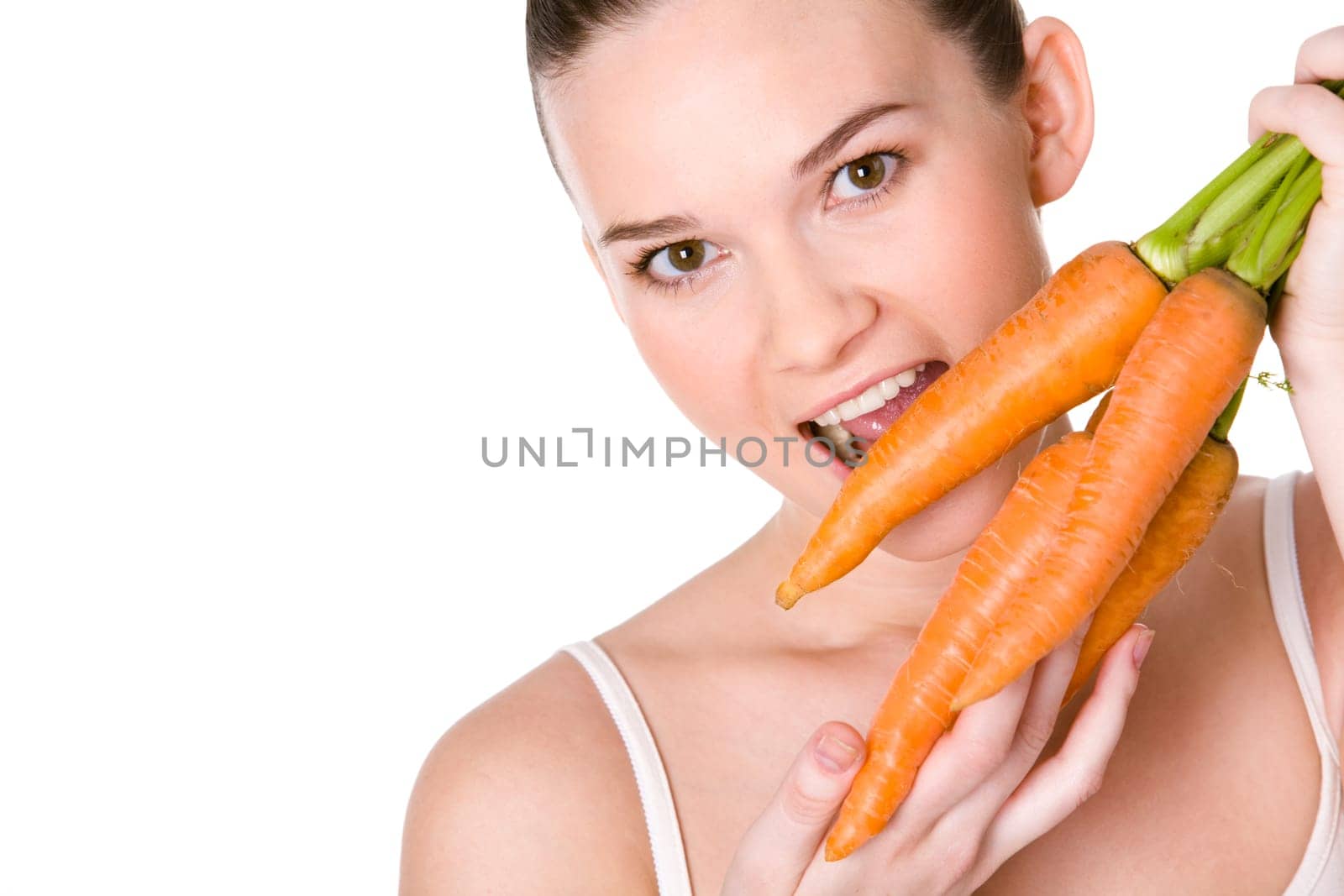 Portrait of pretty girl with open mouth ready to eat ripe carrot