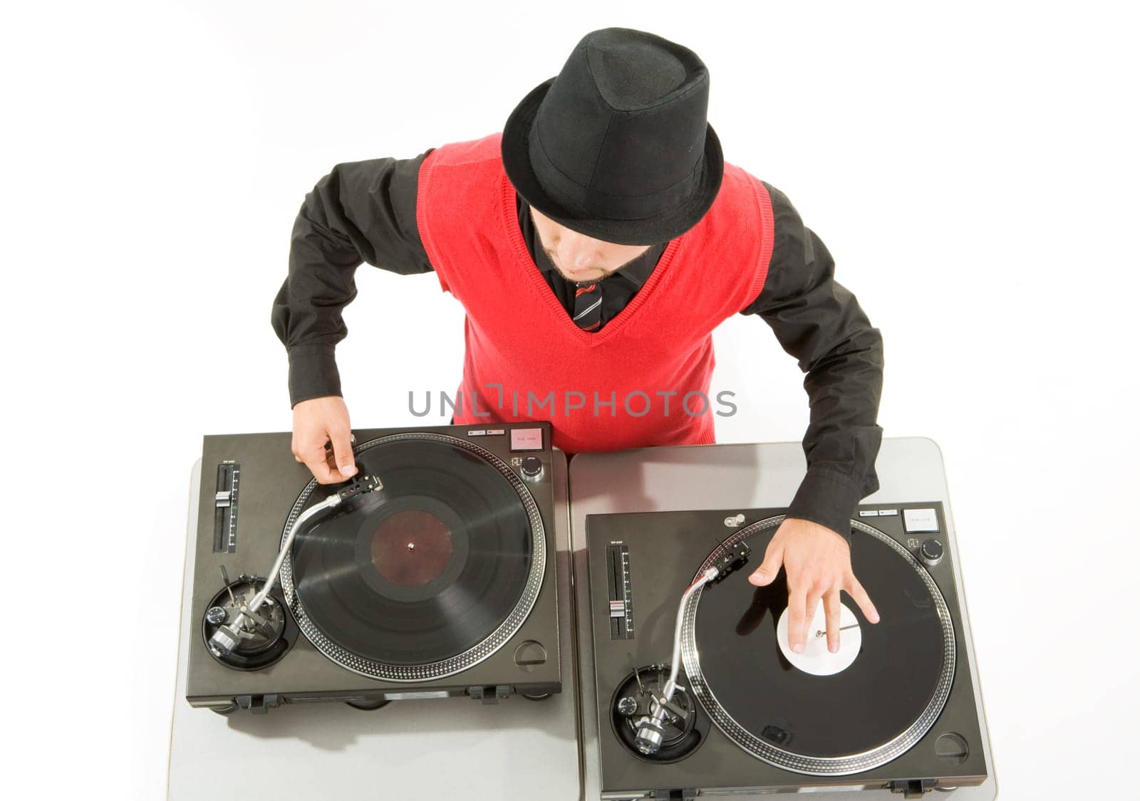 Above view of smart deejay spinning turntables